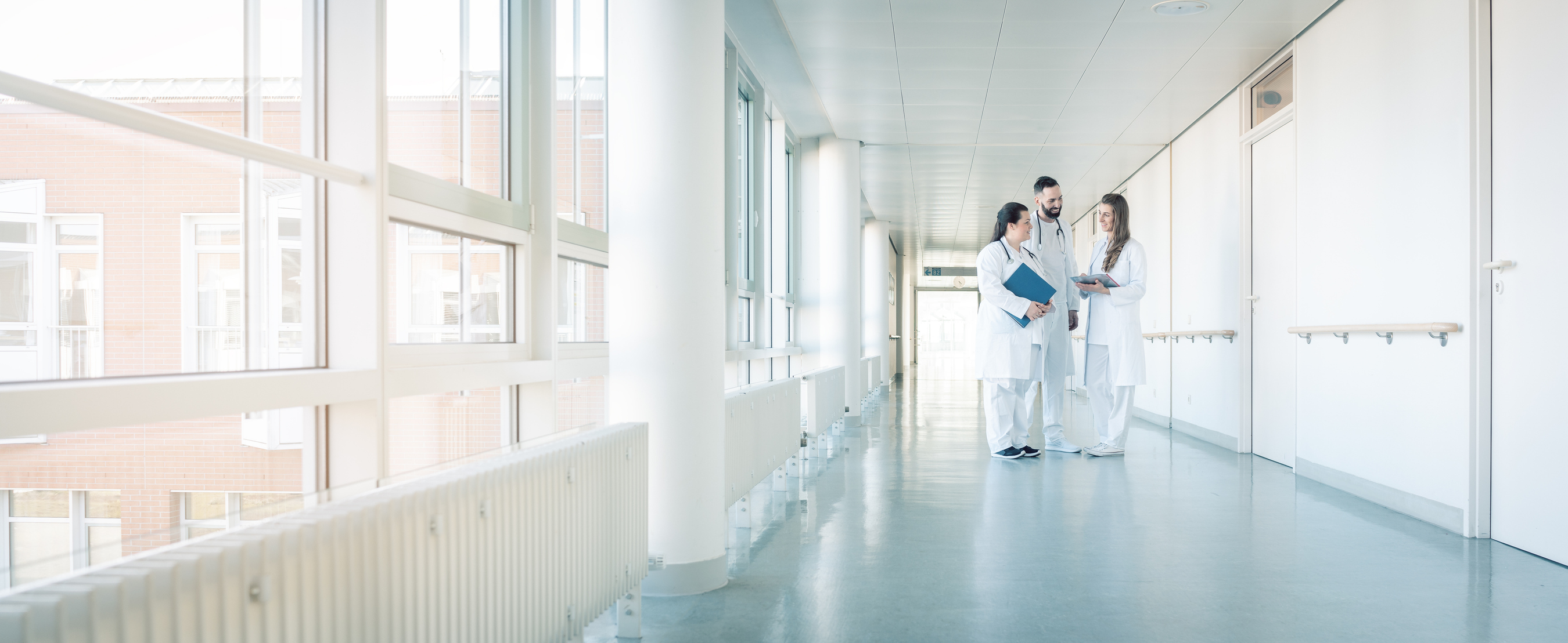 Medical professionals performing a patient examination